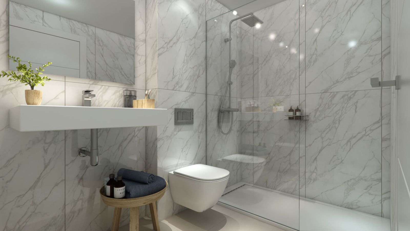 Moderne badkamer met marmeren design, wastafel, toilet en douchecabine.